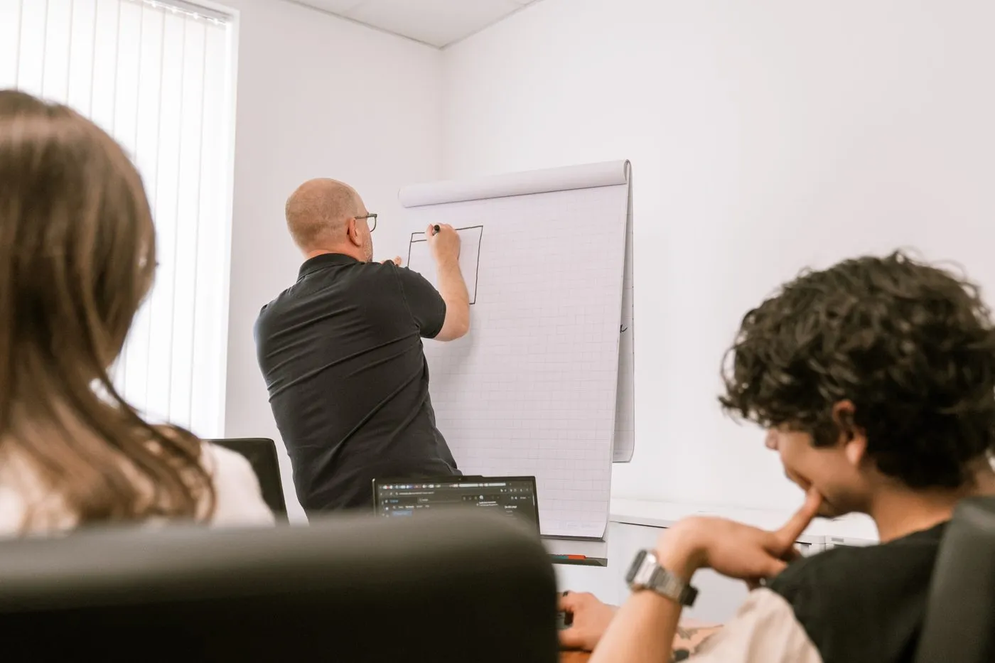Workshop am Flipchart bei Quality Bytes
